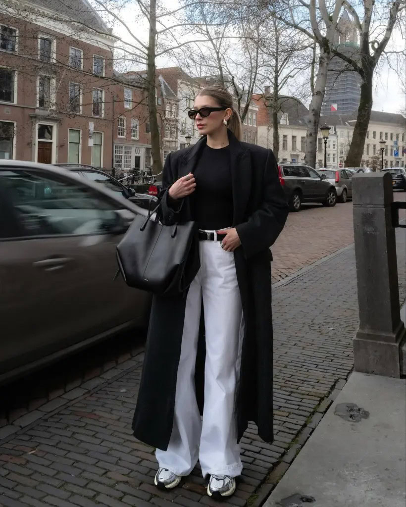 long-black-coat-and-white-jeans